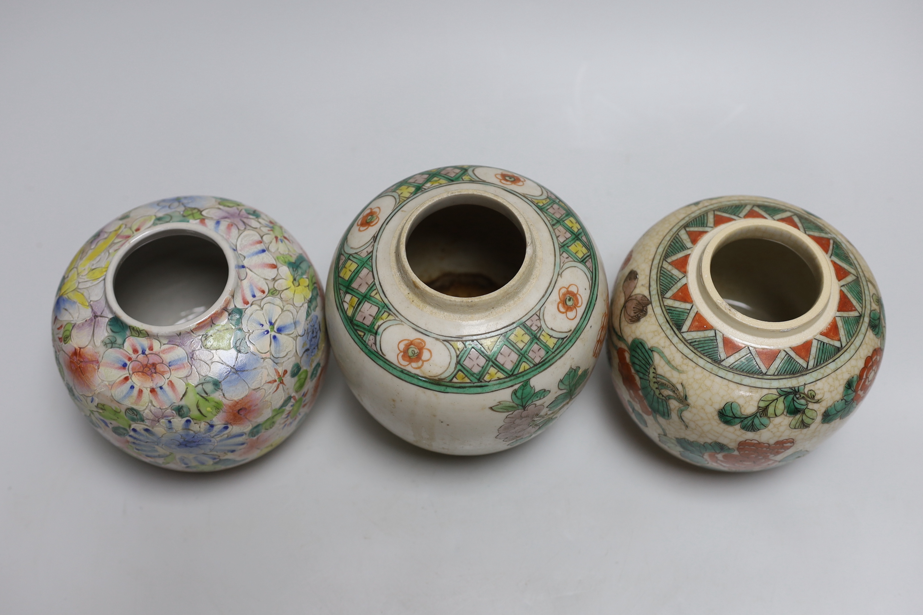 Five Chinese enamelled porcelain ginger jars, one with a cover, tallest 12cm high